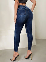 Jeans skinny vita alta lavaggio con candeggina