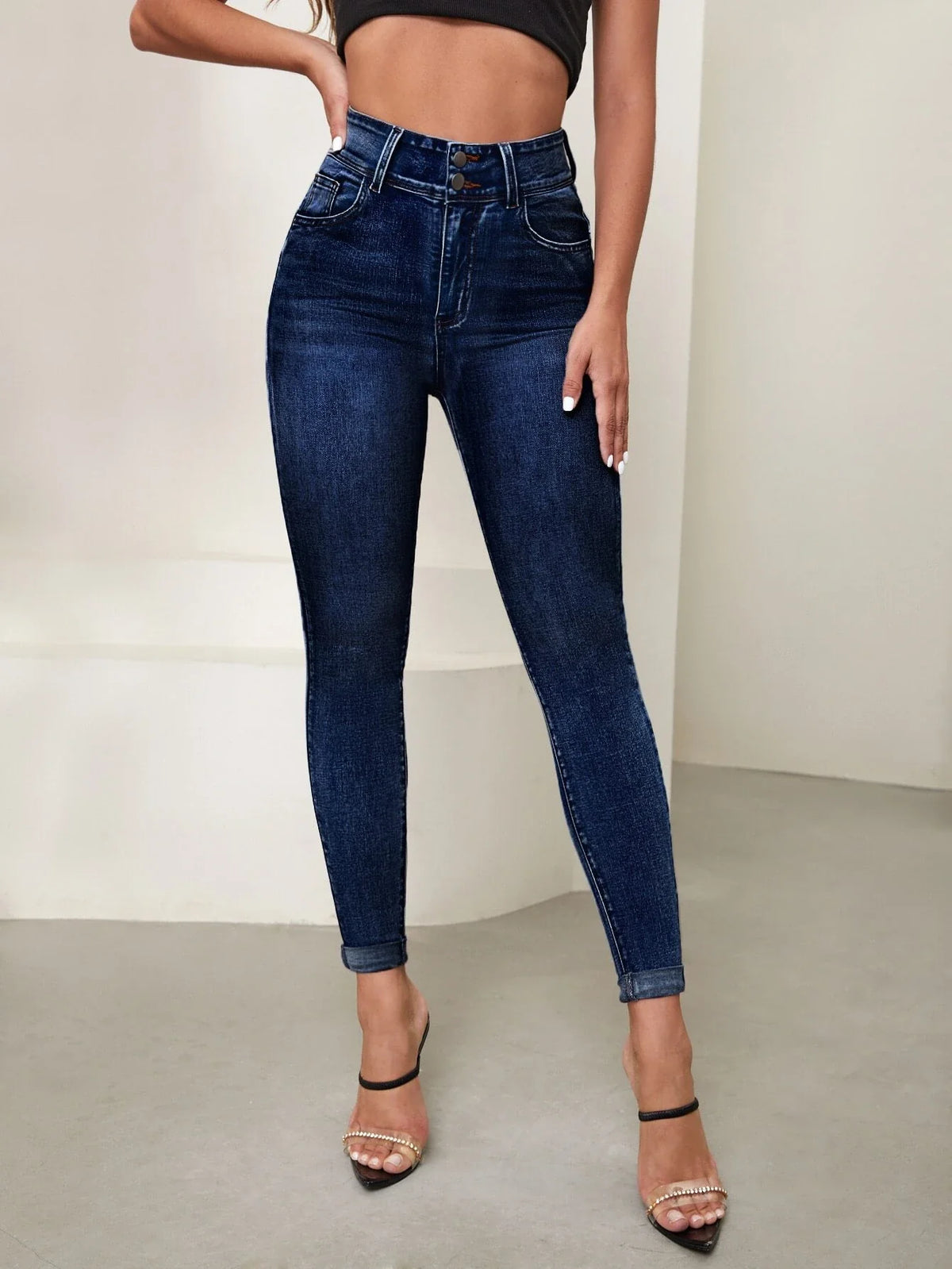 Jeans skinny vita alta lavaggio con candeggina