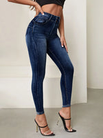 Jeans skinny vita alta lavaggio con candeggina