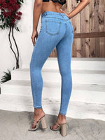 Jeans skinny tasca inclinata