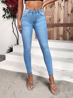 Jeans skinny tasca inclinata
