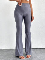 Pantaloni a zampa d'elefante in vita alta e lunghezza extra alta