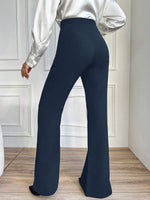 Pantaloni A Zampa Con Doppio Petto E Bottoni Decorativi