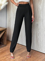 Pantaloni a carota vita media monocromatici da donna