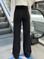 Pantaloni a zampa alta vita alta di colore unito da donna