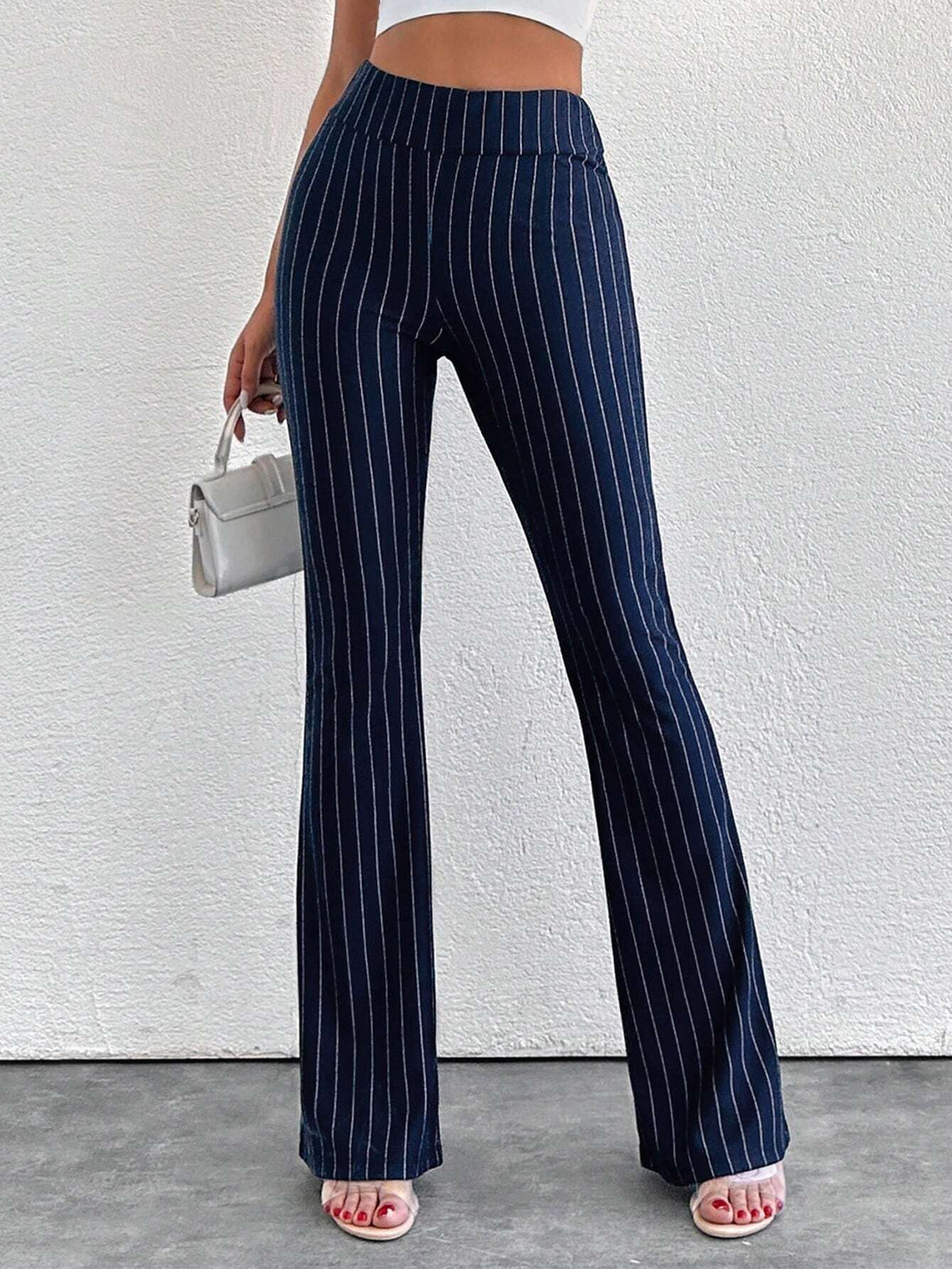 Pantaloni a zampa d'elefante in vita alta e lunghezza extra alta