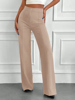 Pantaloni vita alta con bottone frontale