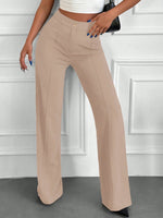 Pantaloni vita alta con bottone frontale