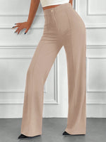 Pantaloni vita alta con bottone frontale