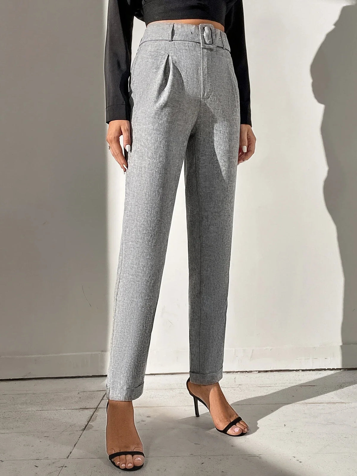 Pantaloni monocolore con cintura zip